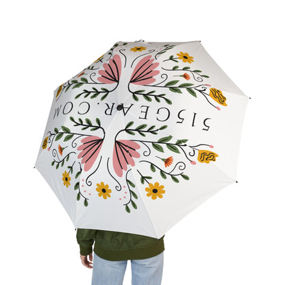 Floral-patterned umbrella with visible branding on a white background
