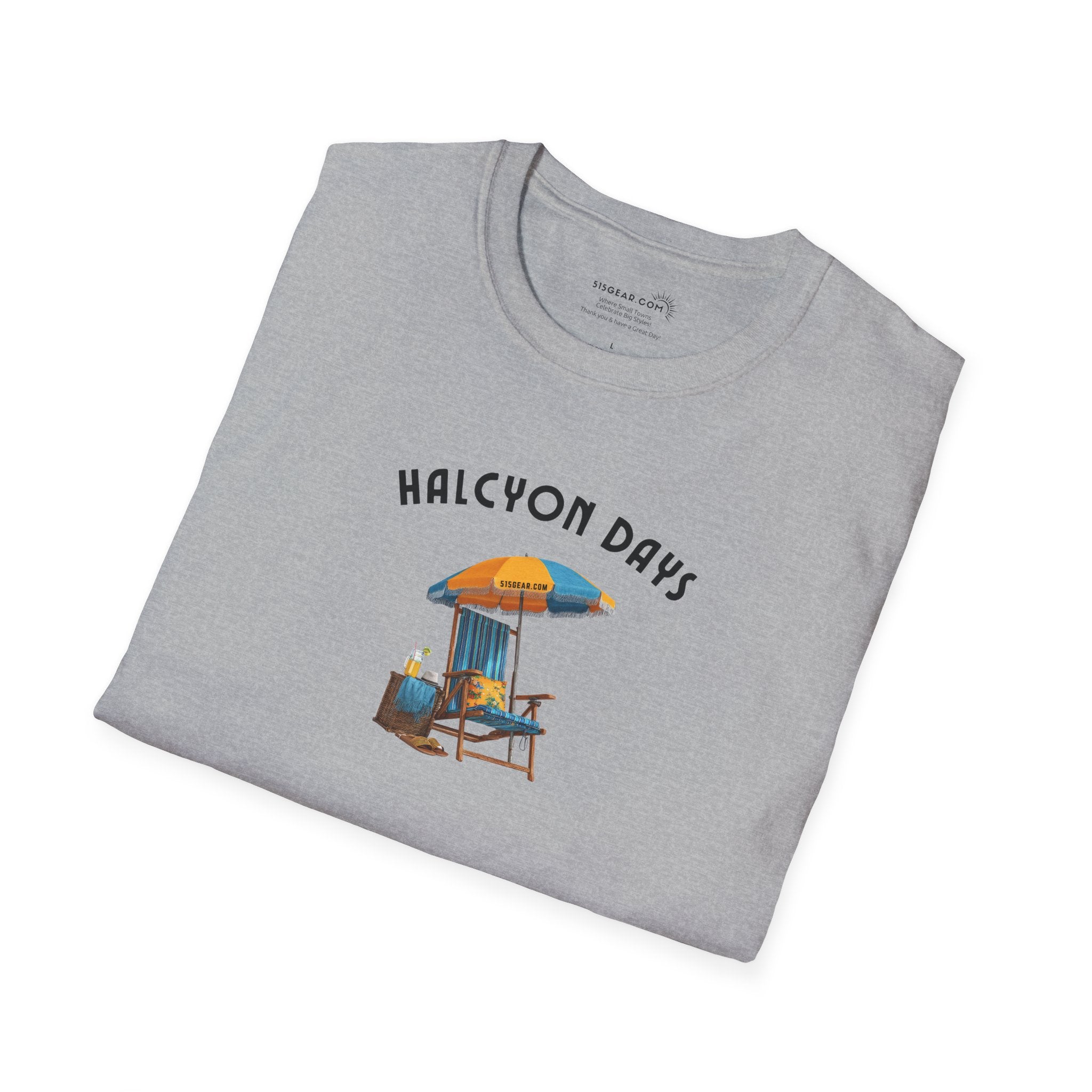 Folded gray t-shirt with 'Halcyon Days' design on a white background